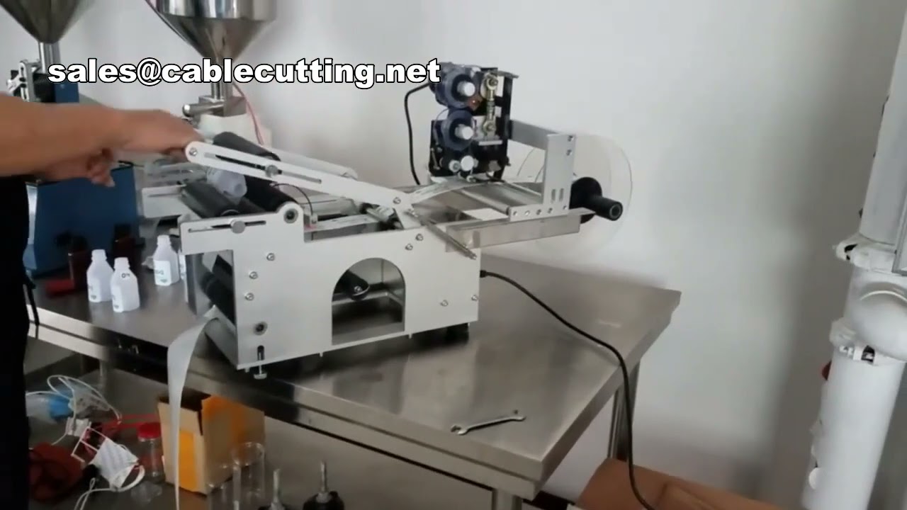 Macchina Etichettatrice per Bottiglie Tonde con Manicotto Termoretraibile Piatto – Etichettatura di Precisione